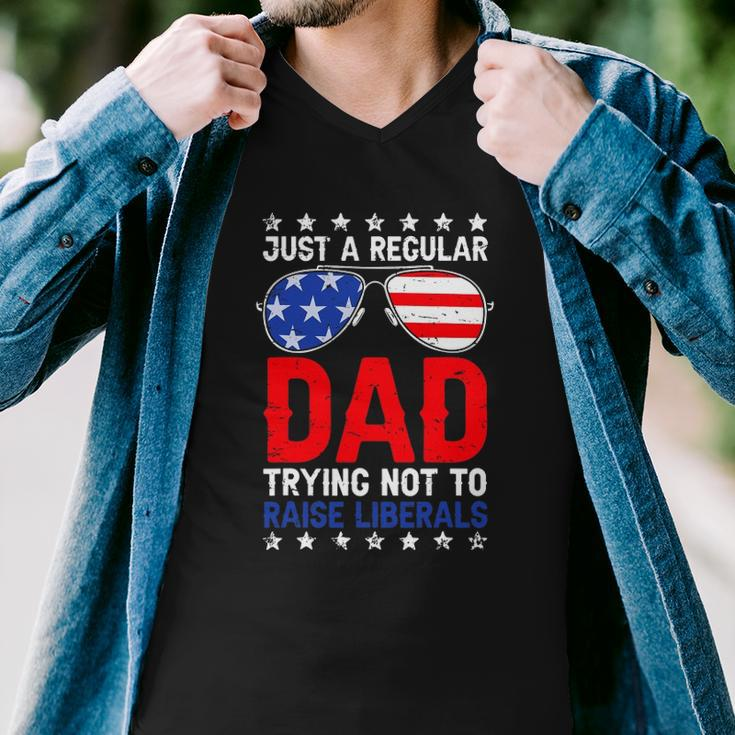 Just A Regular Dad Trying Not To Raise Liberals Voted Trump Men V-Neck Tshirt