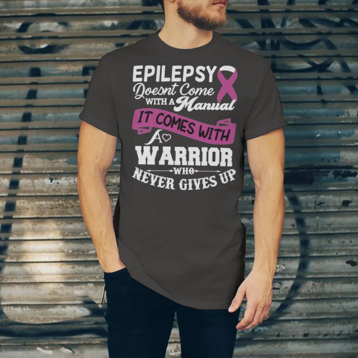 Epilepsy Doesnt Come With A Manual It Comes With A Warrior Who Never Gives Up Purple Ribbon Epilepsy Epilepsy Awareness Unisex Jersey Short Sleeve Crewneck Tshirt