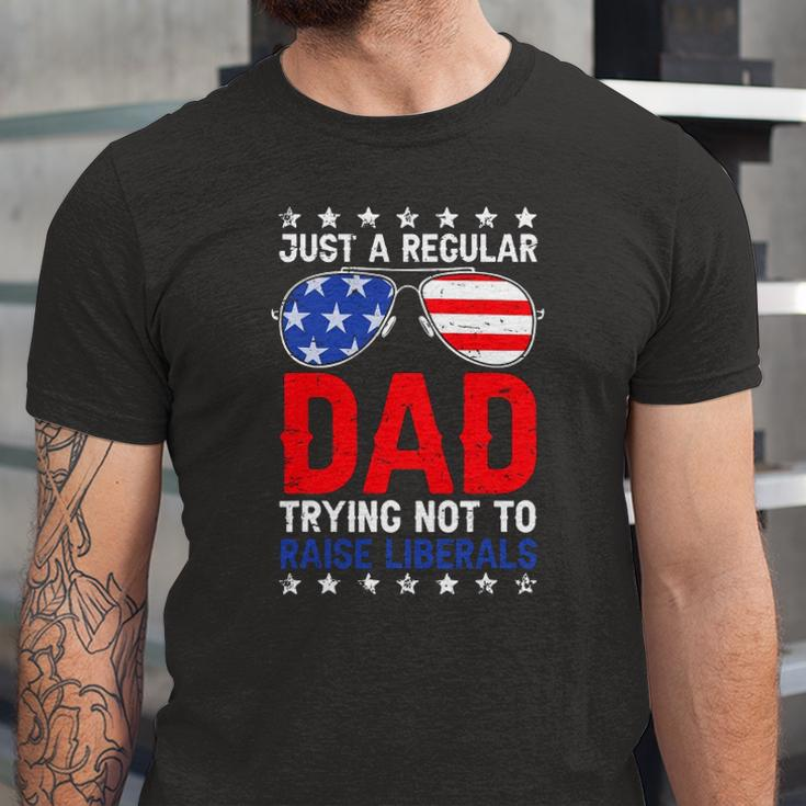Just A Regular Dad Trying Not To Raise Liberals Voted Trump Jersey T-Shirt