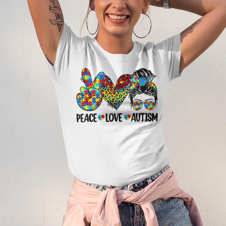 Peace Love Autism Mom Life Messy Bun Blue Autism Awareness Unisex Jersey Short Sleeve Crewneck Tshirt