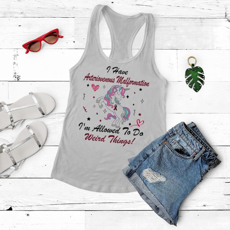 I Have Arteriovenous Malformation Im Allowed To Do Weird Things Funny Unicorn Burgundy Ribbon Arteriovenous Malformation Support Arteriovenous Malformation Awareness Women Flowy Tank