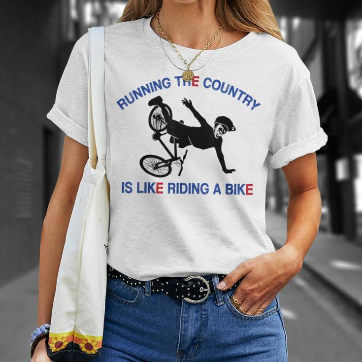 Running The Country Is Like Riding A Bike Funny Ridin Unisex T-Shirt Gifts for Her