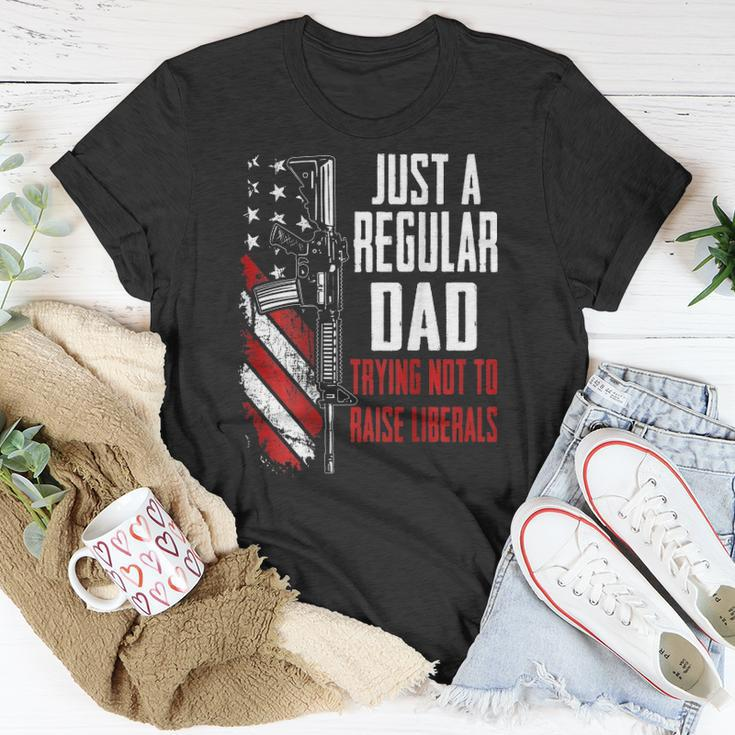 Just A Regular Dad Trying Not To Raise Liberals -- On Back Unisex T-Shirt Unique Gifts