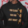Mens Too Close Too Far Just Right Axe Throwing Funny Axe Thrower Hoodie Unique Gifts