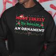 Most Likely To Break An Ornament Santa Hat Xmas Lights Hoodie Funny Gifts