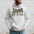 Peace Love Autism Mom Life Messy Bun Blue Autism Awareness Hoodie Gifts for Him