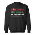 Most Likely To Break An Ornament Santa Hat Xmas Lights Sweatshirt