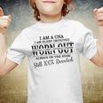 I Am Cna I Am Sleep Deprived Worn Out Always On The Edge Still 100 Devoted V2 Youth T-shirt