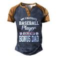 Mens My Favorite Baseball Player Calls Me Bonus Dad Bonus Men's Henley Raglan T-Shirt Brown Orange
